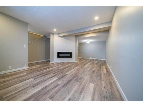 503-4935 Dalton Drive Nw, Calgary, AB - Indoor With Fireplace