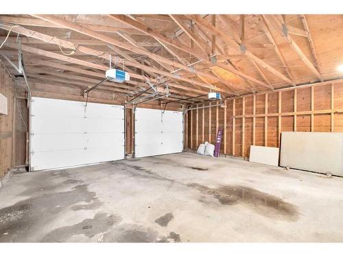 263 Penbrooke Way Se, Calgary, AB - Indoor Photo Showing Garage