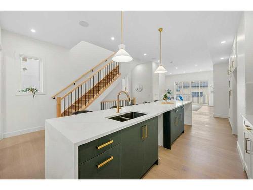 1410 43 Street Sw, Calgary, AB - Indoor Photo Showing Kitchen With Double Sink With Upgraded Kitchen