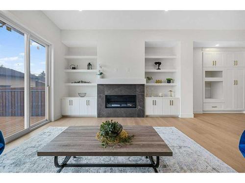 1410 43 Street Sw, Calgary, AB - Indoor Photo Showing Living Room With Fireplace