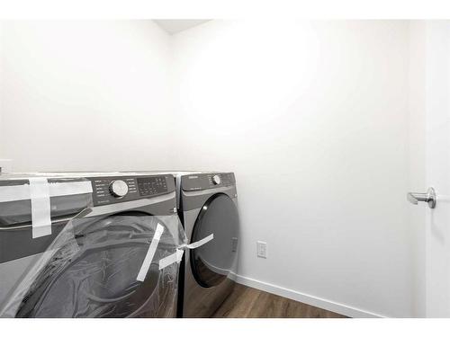 1837 Carrington Boulevard Nw, Calgary, AB - Indoor Photo Showing Laundry Room