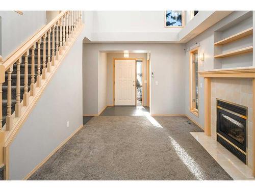 13 Citadel Gardens Nw, Calgary, AB - Indoor Photo Showing Other Room With Fireplace