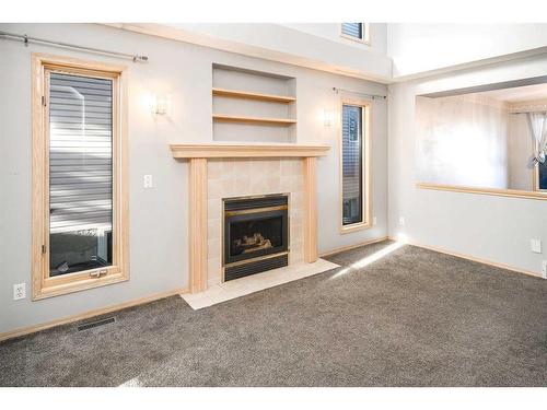 13 Citadel Gardens Nw, Calgary, AB - Indoor Photo Showing Living Room With Fireplace