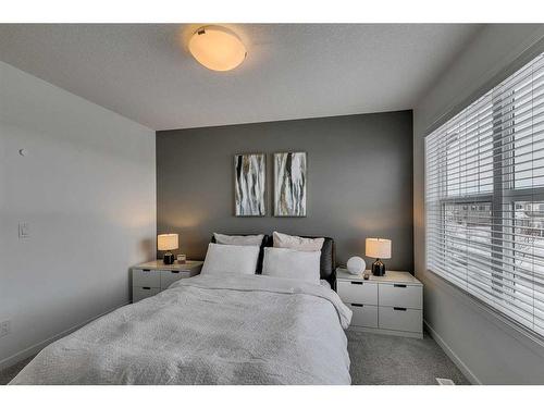 8141 Masters Boulevard Se, Calgary, AB - Indoor Photo Showing Bedroom