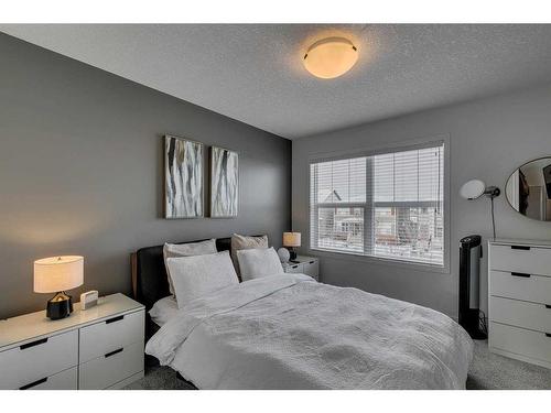 8141 Masters Boulevard Se, Calgary, AB - Indoor Photo Showing Bedroom