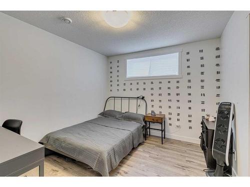 8141 Masters Boulevard Se, Calgary, AB - Indoor Photo Showing Bedroom