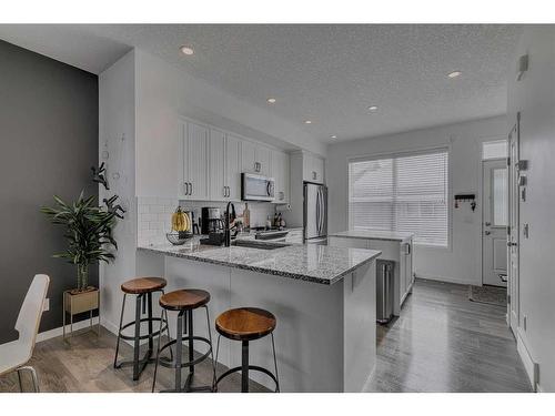 8141 Masters Boulevard Se, Calgary, AB - Indoor Photo Showing Kitchen With Upgraded Kitchen