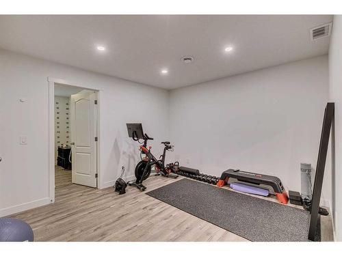 8141 Masters Boulevard Se, Calgary, AB - Indoor Photo Showing Gym Room