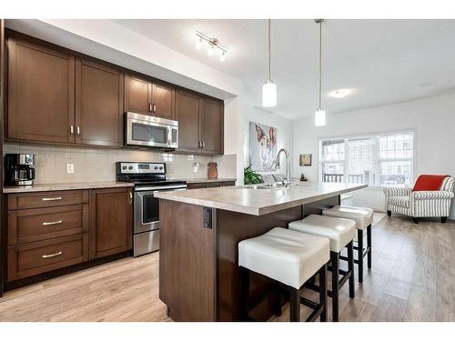 587 Mahogany Boulevard Se, Calgary, AB - Indoor Photo Showing Kitchen With Upgraded Kitchen