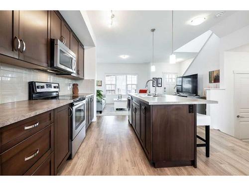 587 Mahogany Boulevard Se, Calgary, AB - Indoor Photo Showing Kitchen With Upgraded Kitchen