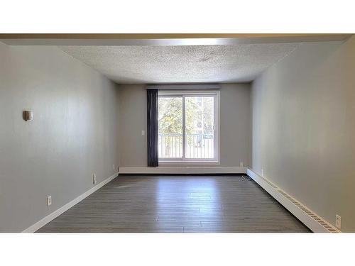 207B-5601 Dalton Drive Nw, Calgary, AB - Indoor Photo Showing Other Room