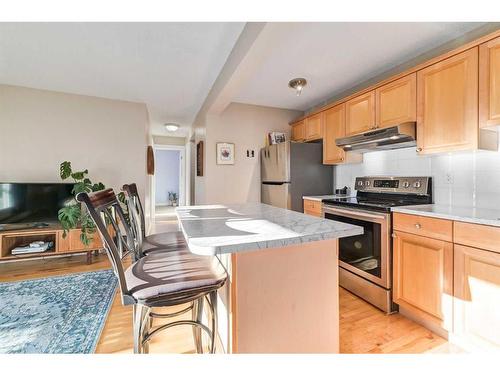 301-222 5 Avenue Ne, Calgary, AB - Indoor Photo Showing Kitchen With Stainless Steel Kitchen