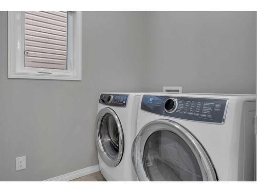 114 Osborne Common Sw, Airdrie, AB - Indoor Photo Showing Laundry Room