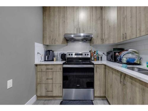 114 Osborne Common Sw, Airdrie, AB - Indoor Photo Showing Kitchen