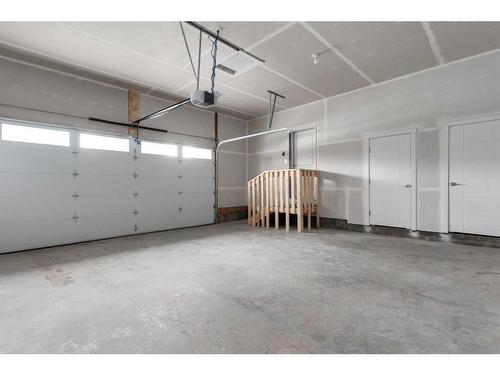 902 Macleod Trail Sw, High River, AB - Indoor Photo Showing Garage