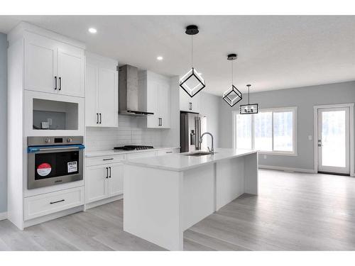 902 Macleod Trail Sw, High River, AB - Indoor Photo Showing Kitchen With Upgraded Kitchen