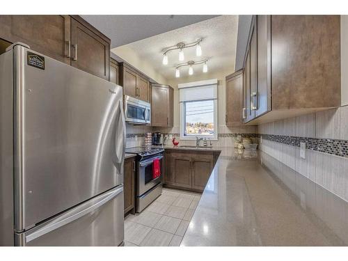 302-16 Varsity Estates Circle Nw, Calgary, AB - Indoor Photo Showing Kitchen With Stainless Steel Kitchen