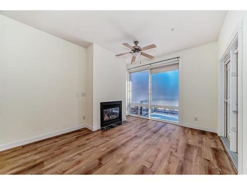 105-880 Centre Avenue Ne, Calgary, AB - Indoor With Fireplace