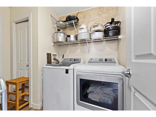 213 Saddlecrest Place Ne, Calgary, AB - Indoor Photo Showing Laundry Room