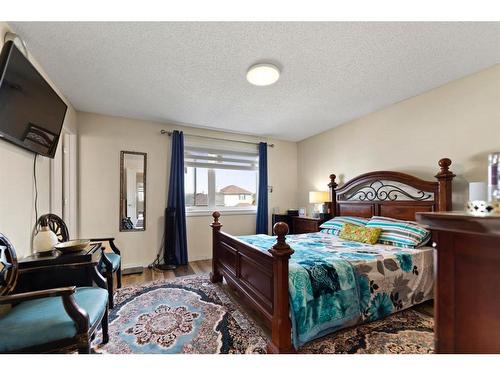 213 Saddlecrest Place Ne, Calgary, AB - Indoor Photo Showing Bedroom