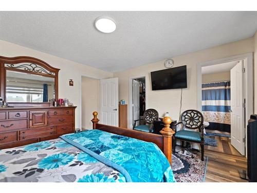 213 Saddlecrest Place Ne, Calgary, AB - Indoor Photo Showing Bedroom