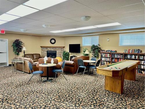 1108-928 Arbour Lake Road Nw, Calgary, AB - Indoor Photo Showing Basement