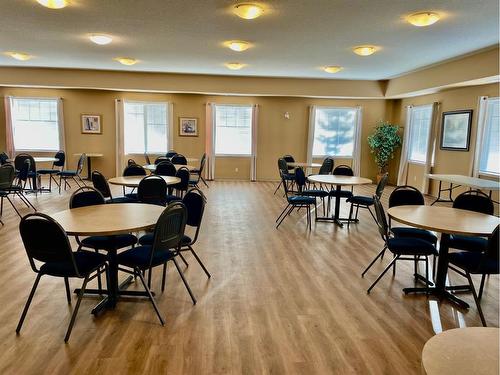 1108-928 Arbour Lake Road Nw, Calgary, AB - Indoor Photo Showing Dining Room