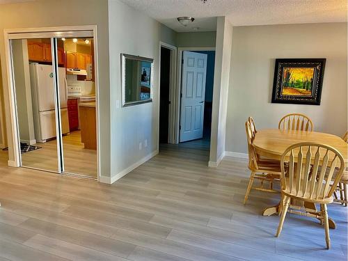 1108-928 Arbour Lake Road Nw, Calgary, AB - Indoor Photo Showing Dining Room