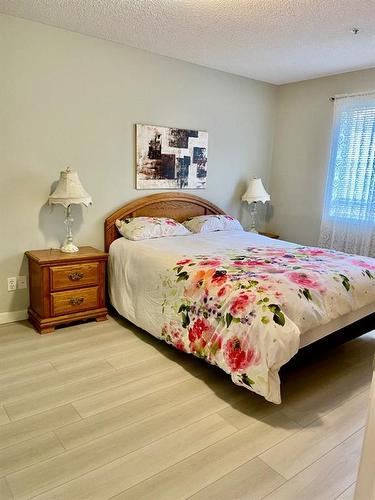 1108-928 Arbour Lake Road Nw, Calgary, AB - Indoor Photo Showing Bedroom