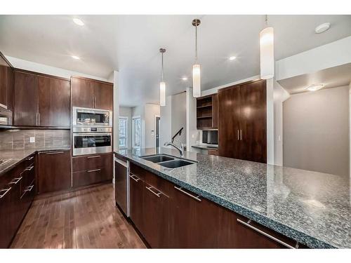 1819 18 Street Sw, Calgary, AB - Indoor Photo Showing Kitchen With Double Sink With Upgraded Kitchen