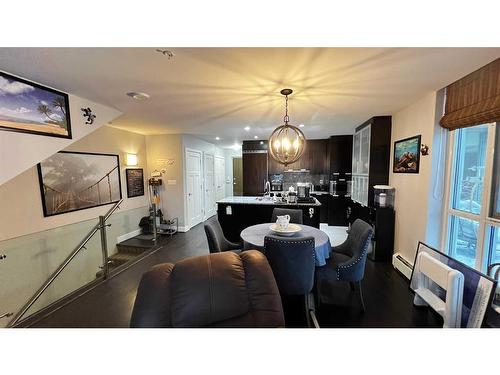 102-99 Spruce Place Sw, Calgary, AB - Indoor Photo Showing Dining Room