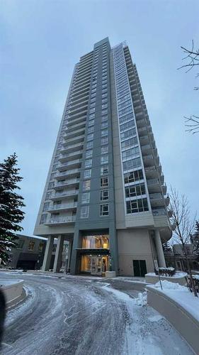 102-99 Spruce Place Sw, Calgary, AB - Outdoor With Facade