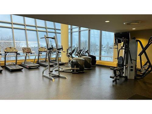 102-99 Spruce Place Sw, Calgary, AB - Indoor Photo Showing Gym Room