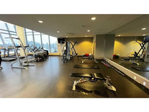 102-99 Spruce Place Sw, Calgary, AB - Indoor Photo Showing Gym Room