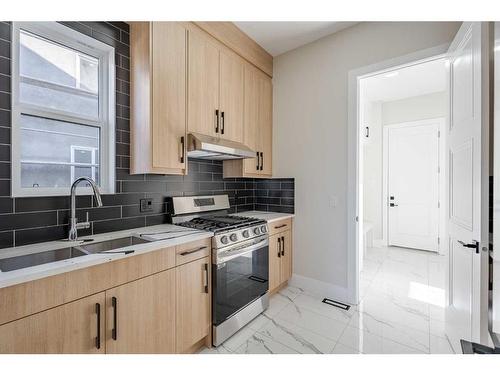 2012 Waterbury Road, Chestermere, AB - Indoor Photo Showing Kitchen