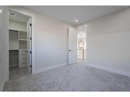 2012 Waterbury Road, Chestermere, AB - Indoor Photo Showing Other Room