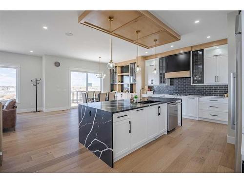 2012 Waterbury Road, Chestermere, AB - Indoor Photo Showing Kitchen With Upgraded Kitchen