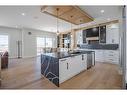 2012 Waterbury Road, Chestermere, AB  - Indoor Photo Showing Kitchen With Upgraded Kitchen 