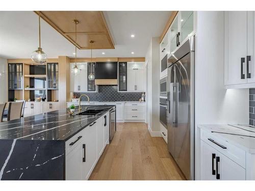 2012 Waterbury Road, Chestermere, AB - Indoor Photo Showing Kitchen With Upgraded Kitchen