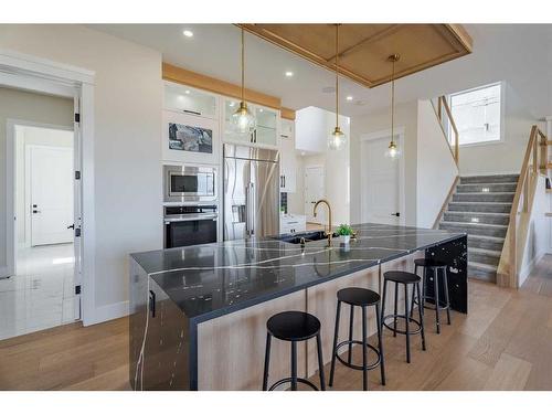 2012 Waterbury Road, Chestermere, AB - Indoor Photo Showing Kitchen With Upgraded Kitchen