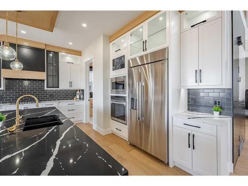 2012 Waterbury Road, Chestermere, AB - Indoor Photo Showing Kitchen With Upgraded Kitchen