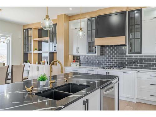 2012 Waterbury Road, Chestermere, AB - Indoor Photo Showing Kitchen With Double Sink With Upgraded Kitchen