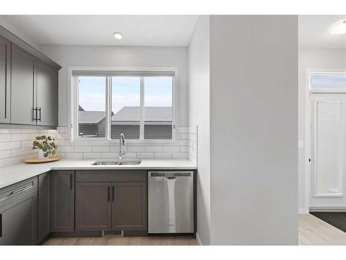 247 Union Avenue Se, Calgary, AB - Indoor Photo Showing Kitchen With Double Sink