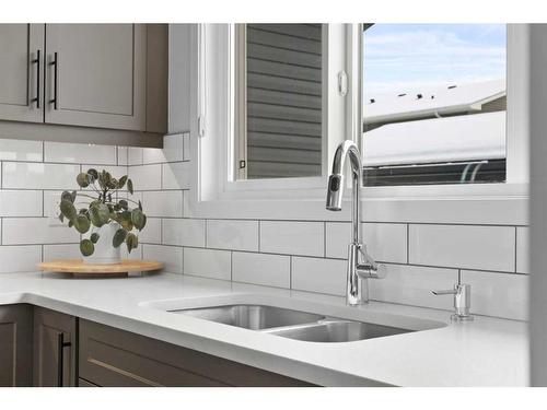 247 Union Avenue Se, Calgary, AB - Indoor Photo Showing Kitchen With Double Sink