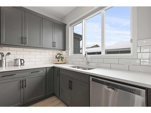 247 Union Avenue Se, Calgary, AB - Indoor Photo Showing Kitchen With Double Sink