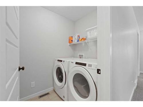 247 Union Avenue Se, Calgary, AB - Indoor Photo Showing Laundry Room