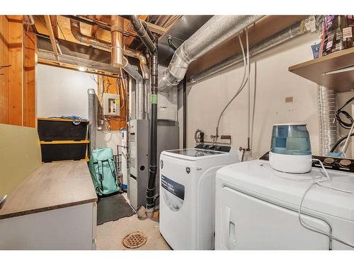 120 Oaktree Close Sw, Calgary, AB - Indoor Photo Showing Laundry Room