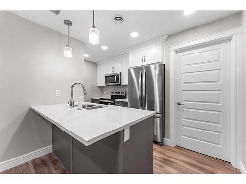 282 Seton Passage Se, Calgary, AB - Indoor Photo Showing Kitchen With Stainless Steel Kitchen With Double Sink With Upgraded Kitchen