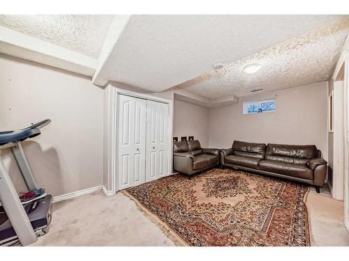 191 Saddleback Road Ne, Calgary, AB - Indoor Photo Showing Gym Room