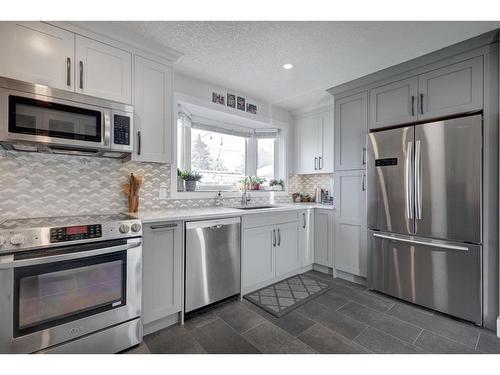 1352 Lake Sylvan Drive Se, Calgary, AB - Indoor Photo Showing Kitchen With Upgraded Kitchen